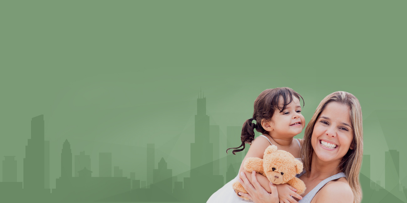 Portrait of a joyful woman holding a smiling young girl who clutches a teddy bear, set against a green background with a subtle silhouette of a city skyline.